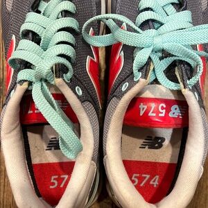 New Balance Gray and Red Sneakers with Blue Laces